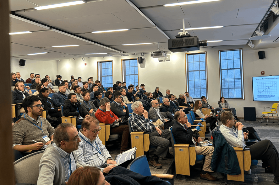 Attendees of the symposium listen during a lecture.