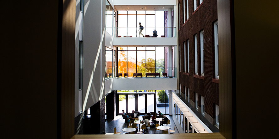 Students working the Science and Engineering Complex's atrium