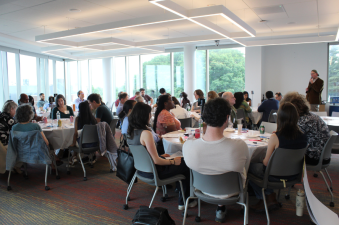 Groups of people seated at the Civic Innovation Initiative's topic prioritization event. 