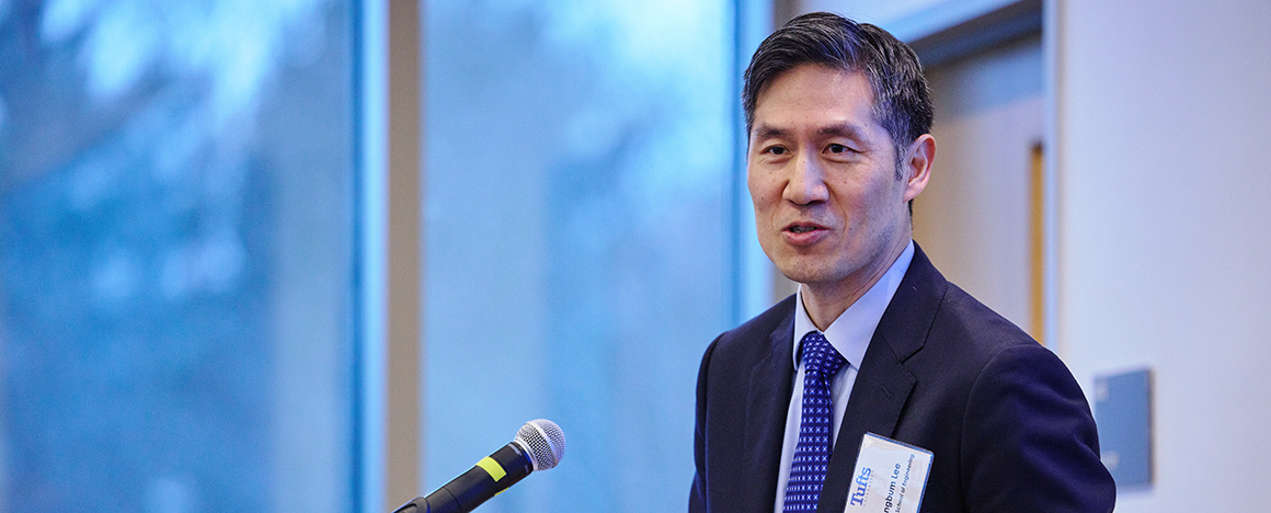 Dean Kyongbum Lee speaking at Tufts University.