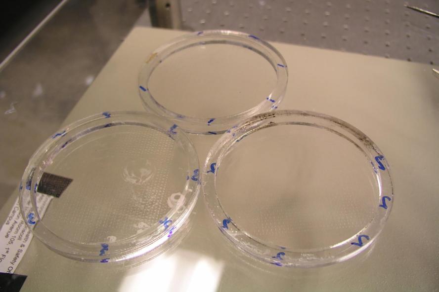 Glass wafers with etched microwells ready to be used as calibration standards for Dual Enhanced Laser Induced Fluorescence (DELIF) measurements of slurry film thickness during ChemiMechanical Planarization (CMP)