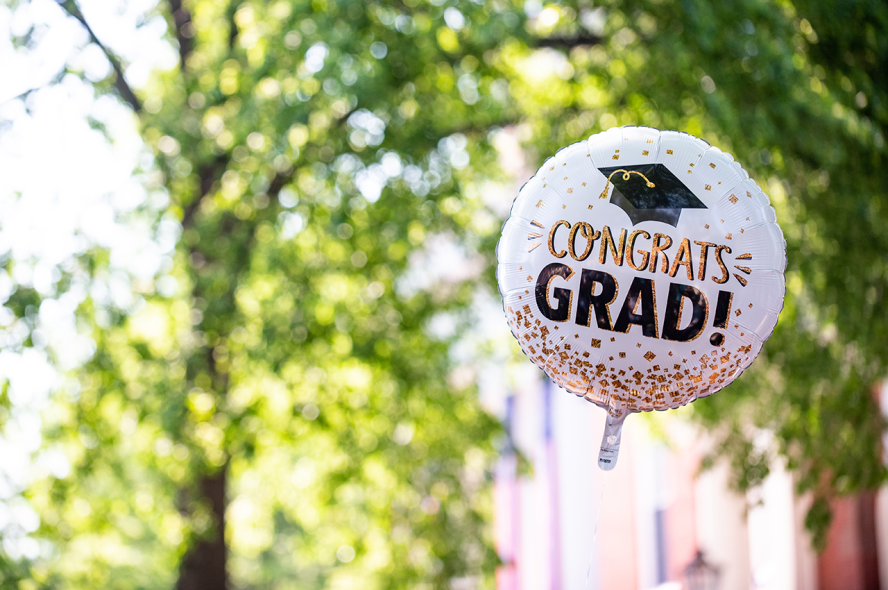 A congrats grad balloon on the Medford/Somerville campus