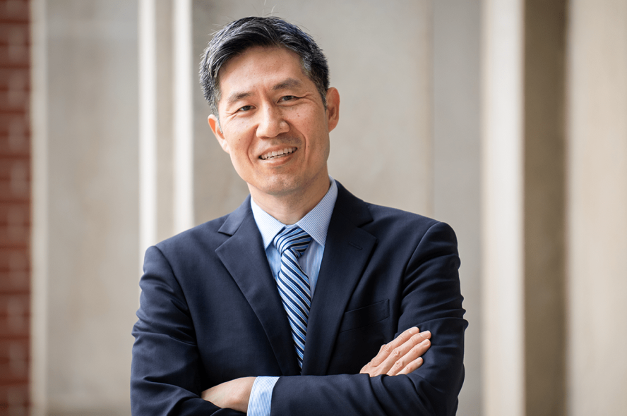 Dean Kyongbum Lee outside Anderson Hall at Tufts University.