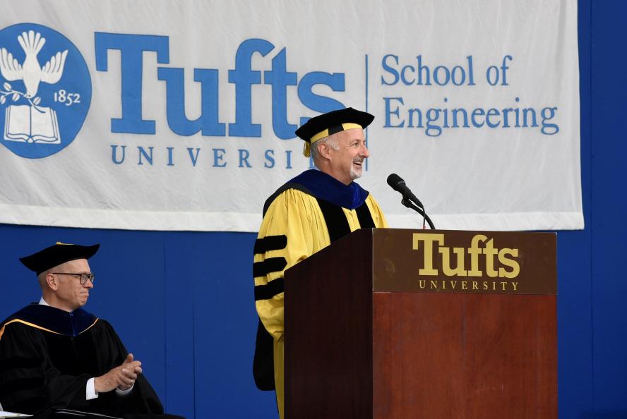 David Rosowsky giving speech at podium in front of Tufts SOE banner