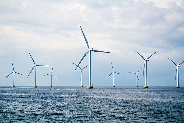 Offshore wind turbines built in the ocean.