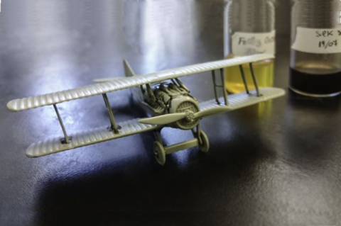 Model airplane constructed using silk-based glue