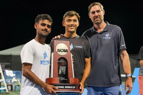 From left, Rishabh Sharda, A23, Josh Belandres, E23, and men’s tennis coach Karl Gregor after the NCAA championship match. Photo: Courtesy of NCAA