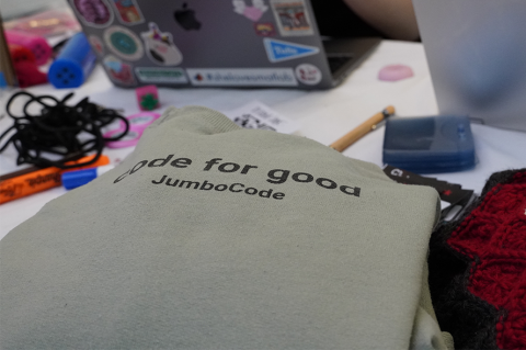 A JumboCode bag that says "code for good"