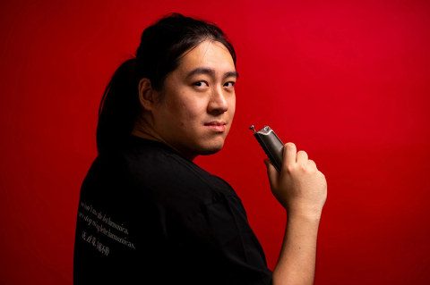 Leon Li with Ling, a harmonica that he designed himself and played in his award-winning performance at the Seoul International Harmonica Festival. Photo: Alonso Nichols.