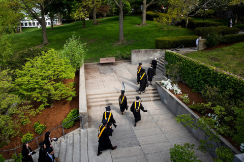 graduates walking to commencement