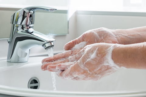 stock image of washing hands