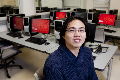 Remco Chang poses in a computer lab