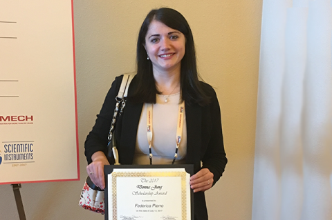 Ph.D. student Federica Pierro poses with her award.