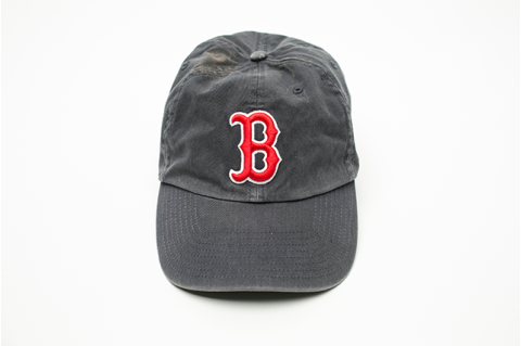 A Boston Red Sox hat against a white background