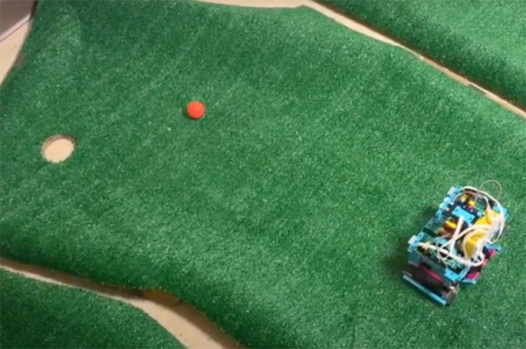 robot on mini golf course