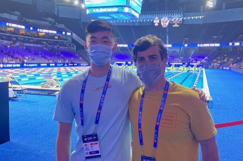Roger Gu, E20, and men’s swimming head coach Adam Hoyt at the Olympic trials