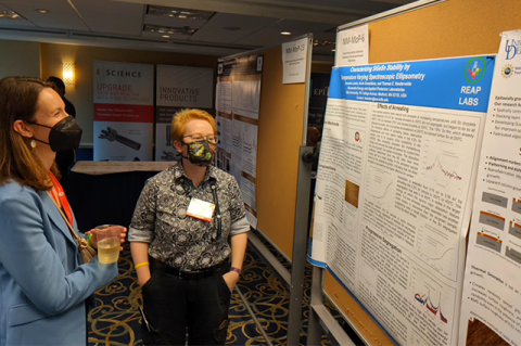 PhD candidate Amanda Lemire (right) presented the poster at NAMBE to an audience that included Tufts alum Maggie Stevens, EG20 (left).