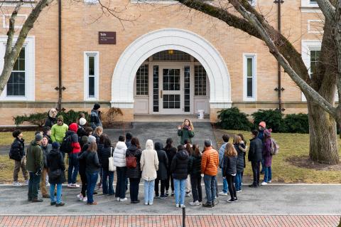 A campus tour in February, a group of newly admitted students standing outside of a building at Tufts. Photo by Alonso Nichols. 
