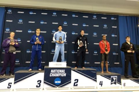 Roger Gu on the winner's podium at the NCAA Division III Swimming and Diving Championships